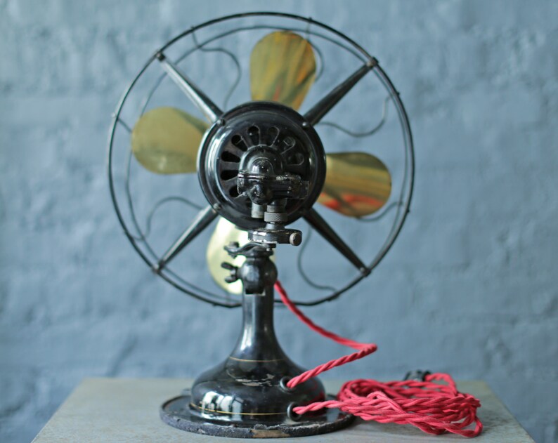 vintage oscillating cast iron base and brass blade fan by Robbins and Myers Co, circa 1920 image 5