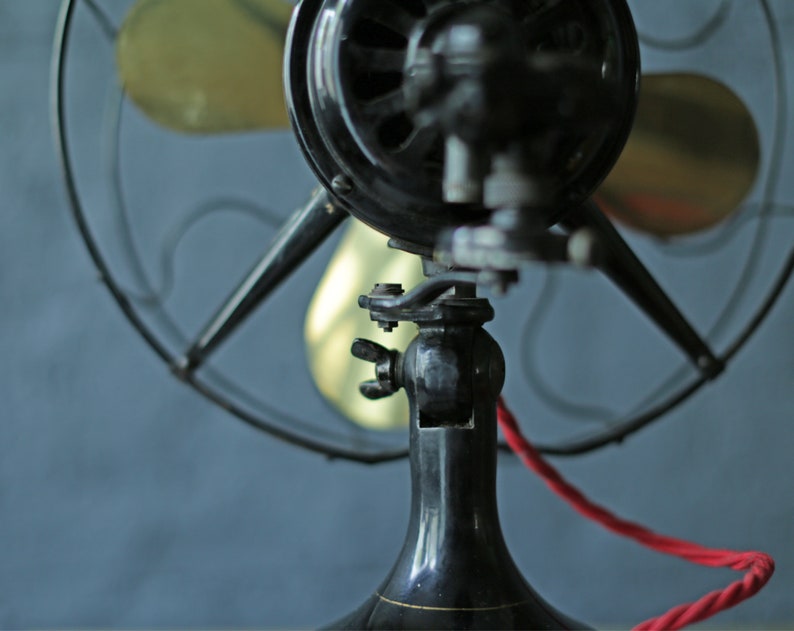 vintage oscillating cast iron base and brass blade fan by Robbins and Myers Co, circa 1920 image 6