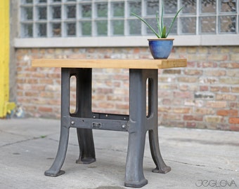 restored vintage industrial side table: repurposed cast iron machine base by Harris Machinery Co., thick wood slab