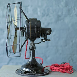 vintage oscillating cast iron base and brass blade fan by Robbins and Myers Co, circa 1920 image 7