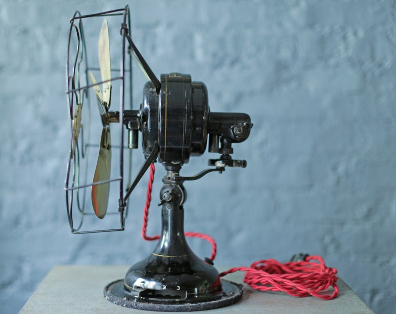 vintage oscillating cast iron base and brass blade fan by Robbins and Myers Co, circa 1920 image 7