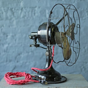 vintage oscillating cast iron base and brass blade fan by Robbins and Myers Co, circa 1920 image 3