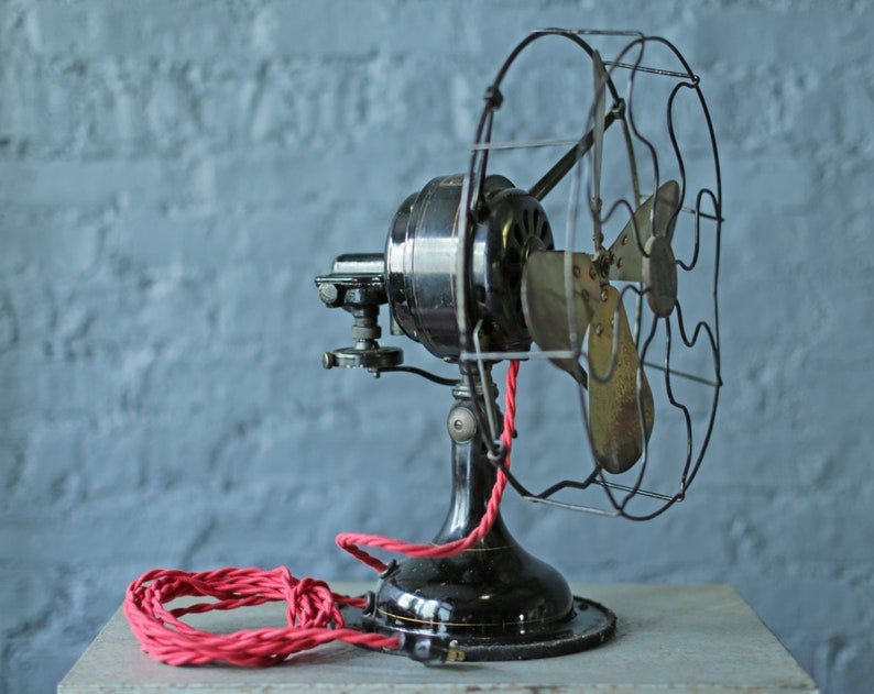 vintage oscillating cast iron base and brass blade fan by Robbins and Myers Co, circa 1920 image 3