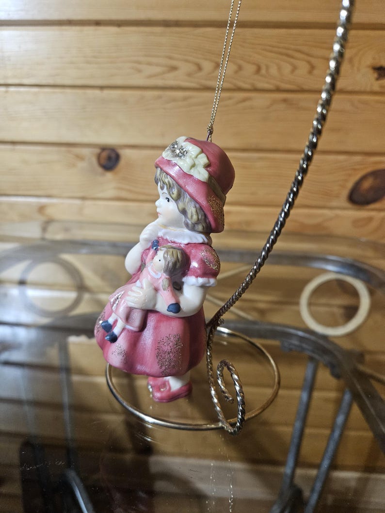 Porcelain Girl Holding Doll Ornament image 2