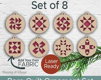 May include: Set of eight laser-cut wooden ornaments featuring different barn quilt designs. The ornaments are ready to be decorated with fabric. The text "Add Your Own FABRIC" and "Laser Ready" is included in the image.