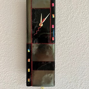 Ebony Pendulum Iridescent Glass Wall Clock image 1