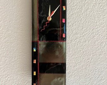 Ebony Pendulum Iridescent Glass Wall Clock