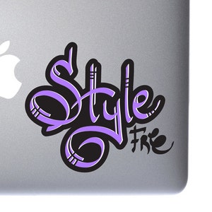 May include: A purple and black vinyl sticker with the word "Style" written in a stylized font. The word "Free" is written in a smaller font below the word "Style".