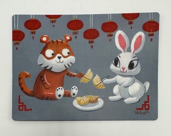 Magnet of Lunar New Year celebration, year of the tiger to rabbit cheering dumplings