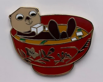 Sea Otter chilling in miso soup hard enamel pin!