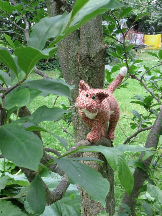 orange and white cat stuffed animal
