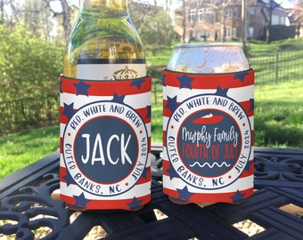 May include: Two red, white, and blue can coolers with a patriotic theme. One cooler says "Jack" and the other says "Murphy Family Fourth of July". Both coolers have a red, white, and blue striped design with stars and a circle with text.