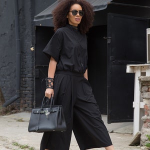 Black jumpsuit with elastic ankle discount