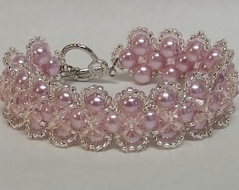 Pearls and Crystals Bracelet, in a pale lilac color.  With  Silver Toggle Clasp.