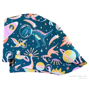 Space Dinosaurs Surgical Scrub Cap, Women&#39;s Adorable Novelty Pixie Scrub Hat | Custom Caps Co.