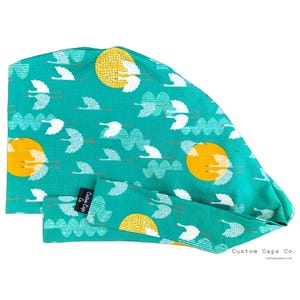 Emerald Cranes kirurgisk skrubbhatt, bomullsmössa med fågelmotiv