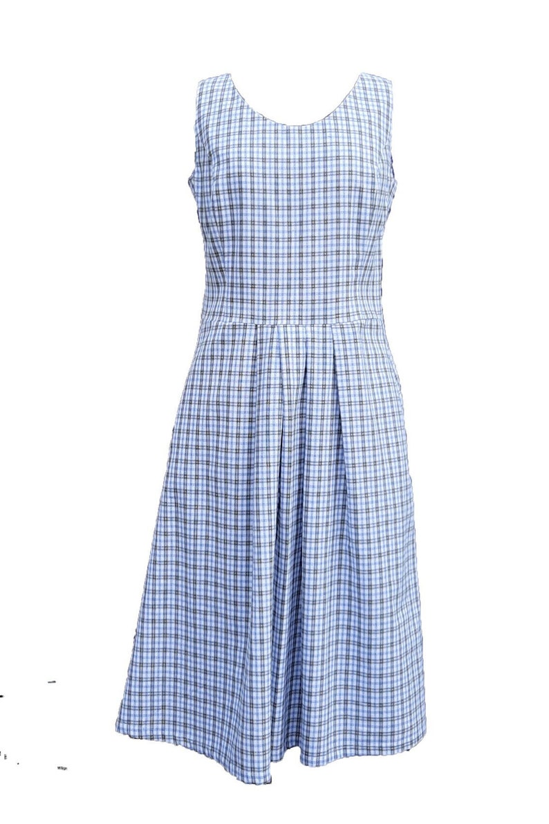 May include: A sleeveless blue and white plaid dress with a pleated skirt.