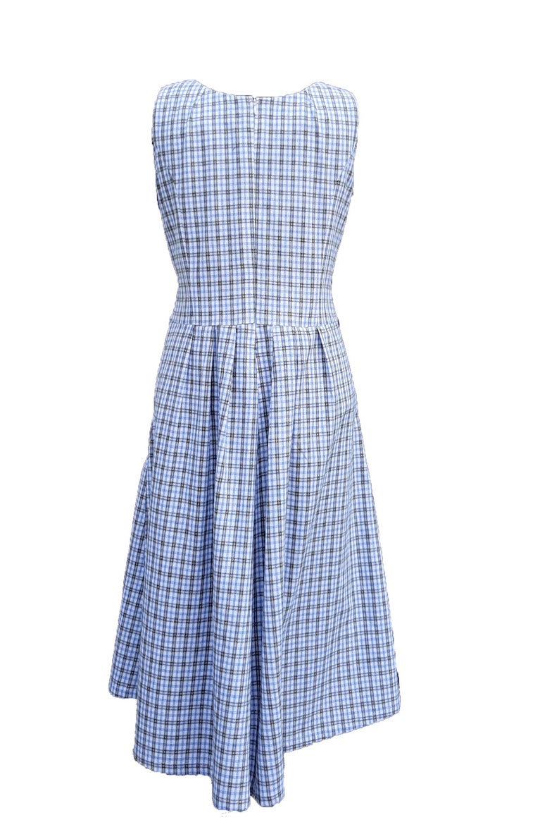 May include: A sleeveless blue and white plaid dress with a pleated skirt.