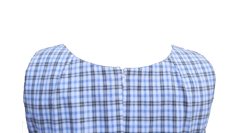 May include: A blue and white plaid dress with a zipper in the back.