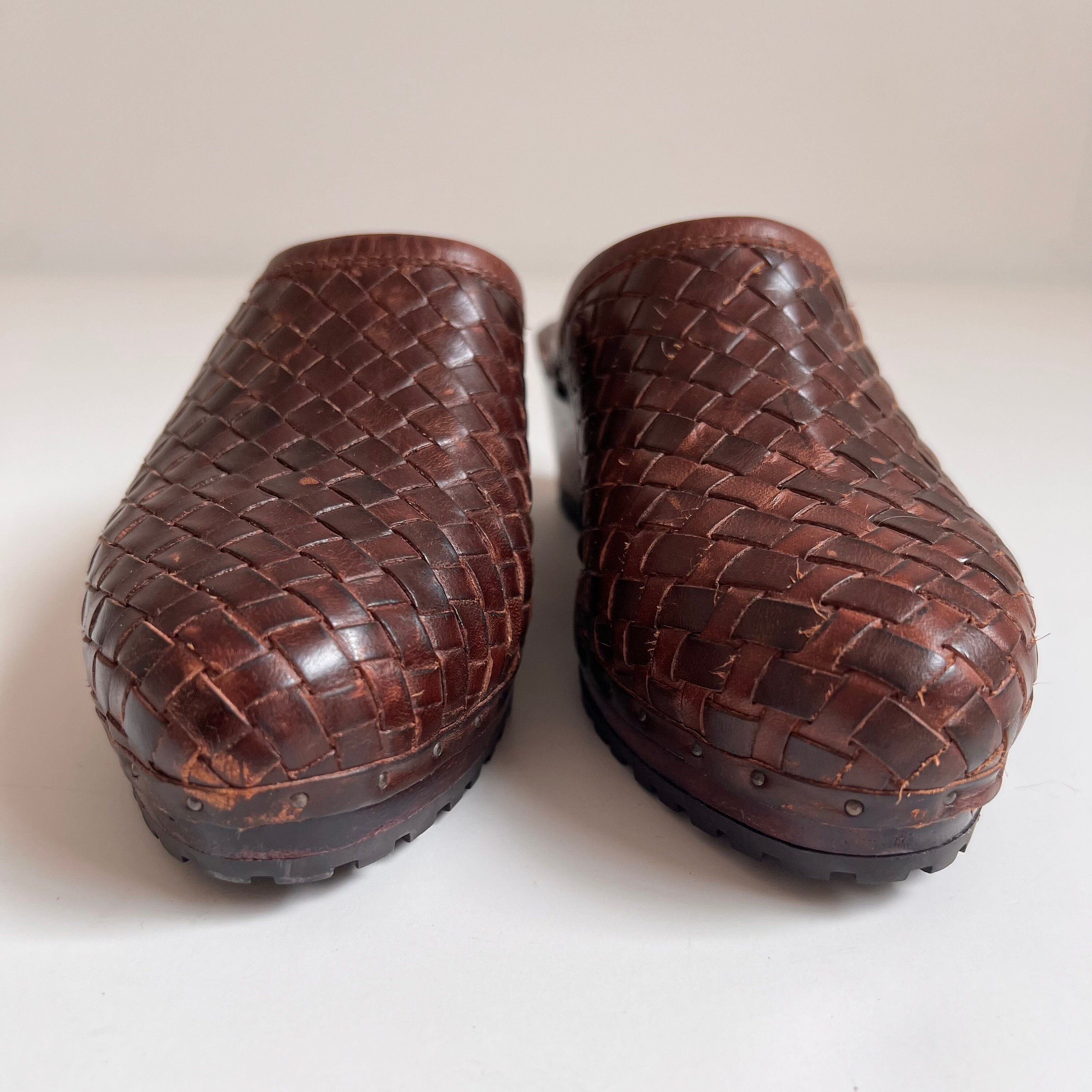 woven leather clogs
