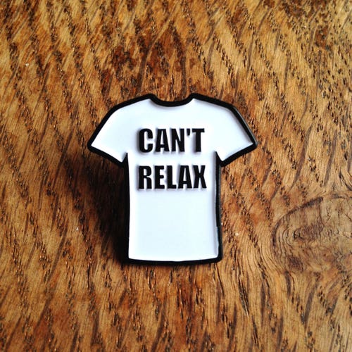 Can't Relax. Black Metal Enamel Pin Tribute to an 80s Design Icon. Too Cool for Old Skool.