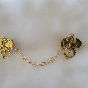 Cloak clasps- Dragons (color- gold)