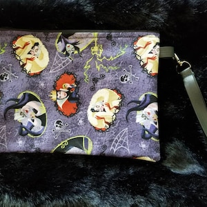 Clutchbag- Disney villains (Cruella Deville,Ursula,Evil Queen, & Maleficent)