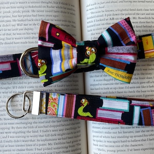 Dog collar, collar with bow, bow tie, book, book worm, inch worm, teacher, back to school, bow tie, library, librarian, book bow tie, smart