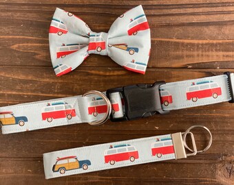 May include: A blue and white bow tie with a pattern of red and yellow vintage vans. A matching blue and white dog collar with the same pattern. A blue and white dog leash with the same pattern.