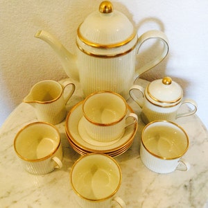 Fitz & Floyd  "CLASSIQUE D'OR" Tea Set Complete Service For 4 (13 Pieces) Ivory Color With Gold Trim. Made In Japan. From 1982. Retired.