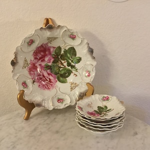 Antique P S GERMANY SORAU Porcelain 7 Pcs Desert Bowl Set. Pink Roses Green Leaves Center, Scrolls At Rim.Signed By Artist A Marcon. 1900’s.
