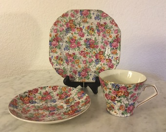 Vintage Lord Nelson Ware &quot;Marina&quot; Pattern, Flat Cup, Saucer & Dessert Plate Set. Chintz, Pink, Yellow, Blue Flowers. Made In England. Disc.
