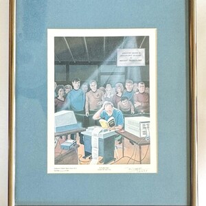 May include: A framed print titled Future Past by Robert Tanenbaum, featuring a group of Star Trek characters observing a person reading a book at a computer terminal. The print includes the text Spaceport Gamma 10 Archaeological Division of Ancient Technology.