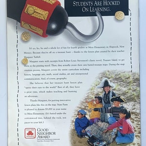 May include: A group of children dressed as pirates are searching for buried treasure on a sandy beach. The children are holding a treasure map and a chest. The image includes the text "Good Neighbor Award" and "State Farm Insurance Companies".