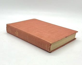 May include: A red hardcover book with the title "The Trial of the  Scottish  Witch" by  W.  Scott  Potter.