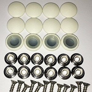 May include: A hardware kit featuring cream-colored, domed screw covers, metal snap fasteners, and silver screws. The kit includes various components for furniture or other projects, providing a complete set for assembly or repair.