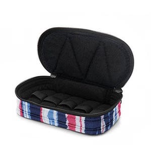 May include: A blue and pink striped travel case with a black zipper and a soft black interior. The case has multiple compartments for holding small items.