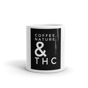 May include: White ceramic mug with a black rectangle design. The rectangle has white text that reads "Coffee, Nature, & THC".