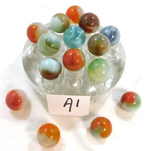 Vintage group of 15 mixed glass marbles for collectors variety colors all nice