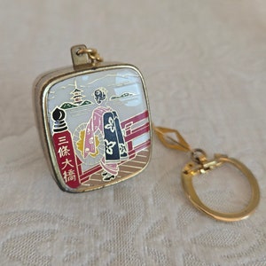 Vintage Sankyo Music Box Keychain With Photo Holder and Mirror