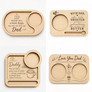 May include: Four light-colored wooden snack and beverage trays with engraved text and graphics. Each tray features circular cutouts for cups and rectangular slots for spoons or snacks, with various messages dedicated to dads and coffee or tea themes.