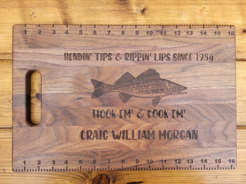 wood cutting board get finished with multiple coats of mineral oil, engrave your own message is the best fishing gift for men