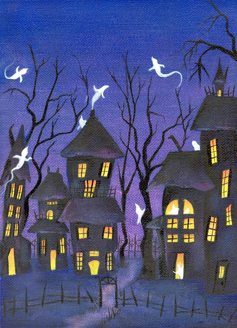 May include: A whimsical Halloween-themed painting depicts a spooky village of dark houses with glowing yellow windows. White ghost figures float among the bare, black tree branches against a deep blue sky. A wooden fence and gate are in the foreground.