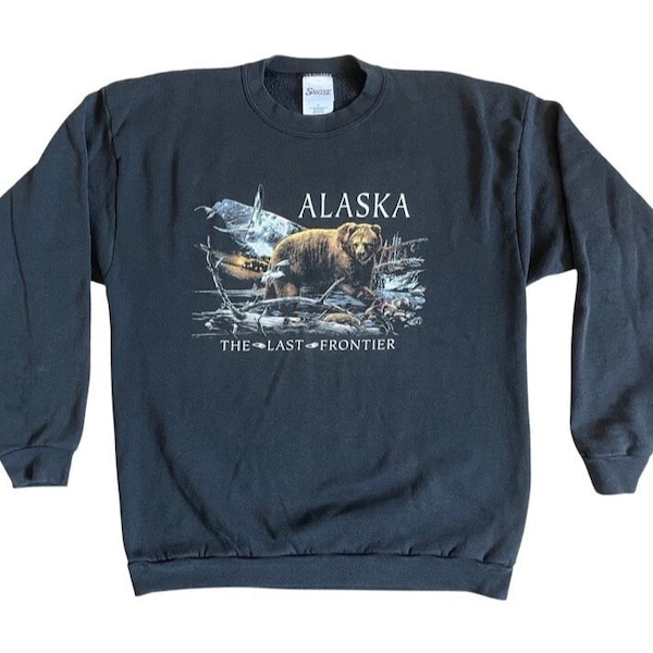 Vintage 90's Alaska "The Last Frontier" graphic crewneck sweatshirt. Tag size X-Large. Made in the USA of a Cotton Blend.