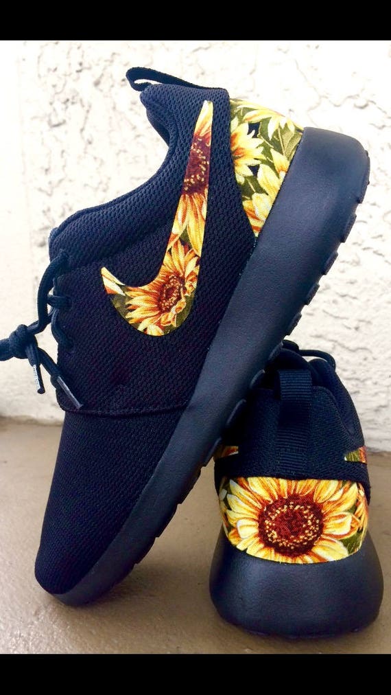 black nikes with flowers