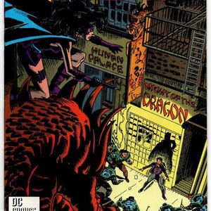 May include: A vintage DC comic book titled The Huntress, issue number 4, dated July 1989. The cover features a dark-haired character in a purple and black costume crouching above a large red dragon, with text reading Night of the Dragon.
