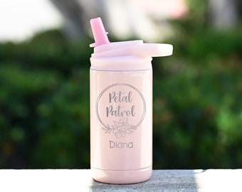 May include: Pink stainless steel water bottle with a straw lid. The bottle has a floral design and the text "Petal Patrol" and "Diana" on it.