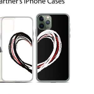 May include: Two iPhone cases with a black and white heart design. The heart is drawn with red and white lines. The text "Should be bought together NOT A PACK" is below the cases.