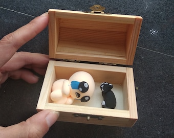 La reliure de la figurine de coffre d'Isaac