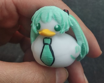 Hatsune Miku and black rock shooter rubber duck inspired Vocaloid keychain